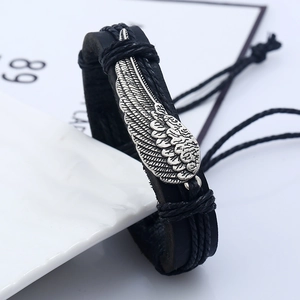 Retro handmade black leather braided bracelet with silver alloy wing charm for men