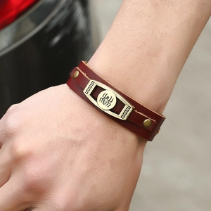 Bracciale vintage in pelle marrone con placca in lega di ragno in bronzo antico