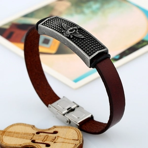 Vintage men's brown leather bracelet with antique eagle totem metal plate and steel clasp