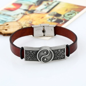 Retro brown leather bracelet featuring a silver Yin Yang Bagua metal charm and buckle