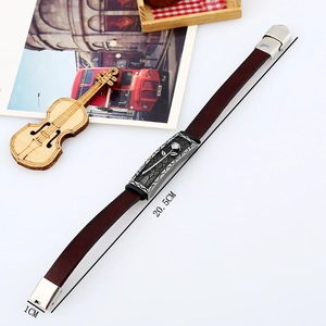 Vintage brown leather bracelet with rose engraved metal plaque and silver clasp