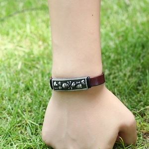 Punk style dark brown leather bracelet with silver skull metal plate for men