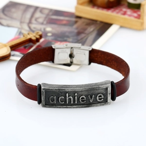 Vintage reddish brown leather bracelet with an engraved achieve metal plaque and buckle