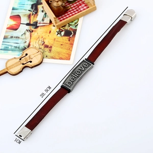 Detailed view of leather bracelet with believe metal plate measuring 20.5cm long