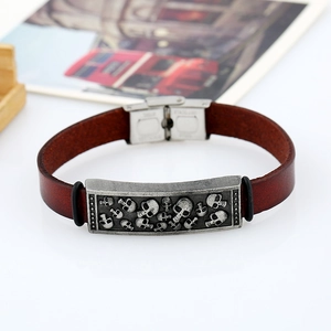 Vintage brown leather skull bracelet with a polished stainless steel clasp for men