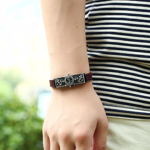 Vintage dark brown leather anchor bracelet for men featuring retro nautical engravings