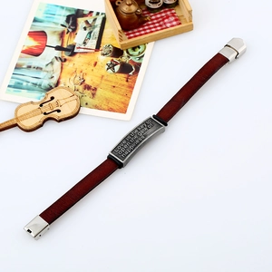 Brown leather couple bracelet with silver plaque engraved with motivational quote