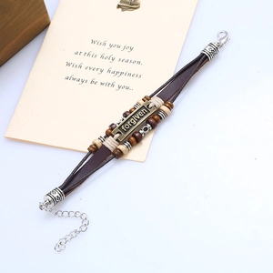 Vintage multilayer leather bracelet with bronze 'forgiven' plate and wooden beads