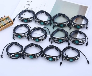 Braccialetti regolabili in pelle nera intrecciata a mano con 12 ciondoli zodiacali