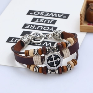 Retro multilayer leather beaded bracelet with dark brown cords and silver alloy badge