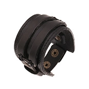 Detail of black double-layered leather cuff bracelet with stitching and snap buttons