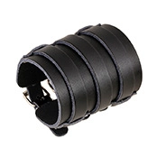Detail showing the multi-layer black leather texture and metal buckle of the punk wristband