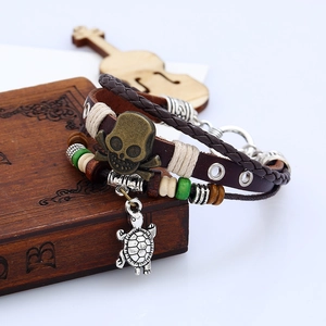 Retro punk multi-layer leather bracelet featuring a bronze skull and silver turtle charm