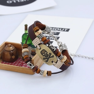 Handmade multilayer leather bracelet with skull metal plate and vintage beads