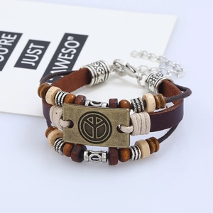 Vintage multilayer leather bracelet with peace sign charm and wooden beads