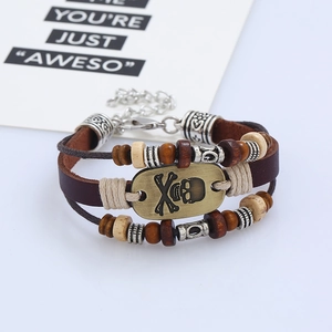 Handmade multilayer punk leather bracelet with bronze skull charm and wooden beads