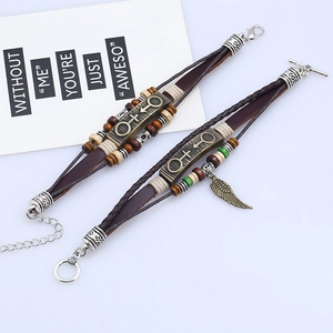 Bracelet rétro en cuir fait main avec perles, breloques ailes et symboles de genre