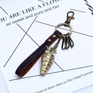 Vintage leather keychain with bronze hooks and a cute carrot charm for women bags