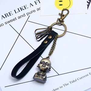 Vintage bronze Buddha keychain with genuine black leather loop and functional metal hooks