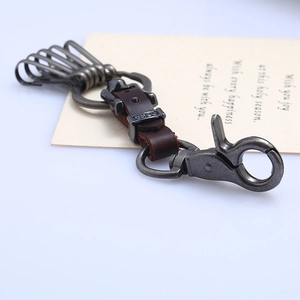 Vintage leather keychain with five split rings and a spring lobster clasp in old silver