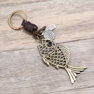 Retro handmade punk style braided leather keychain with alloy fish charm and metal quote plate