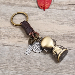 Vintage handmade leather car keychain with bronze Buddha charm and engraved metal tag