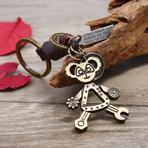 Vintage bronze robot keychain with hand-woven leather and engraved inspirational tag