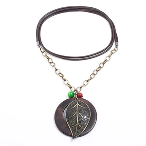 Retro long necklace with alloy leaf pendant, wooden ring, and colorful beads on wax cord