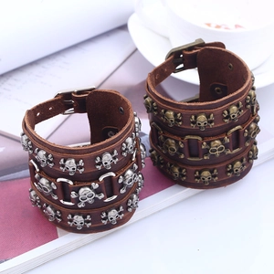 Vintage punk leather bracelet with skull studs and adjustable buckle closure