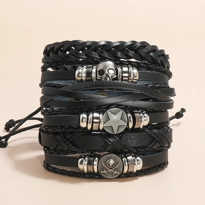 Multilayer black woven leather bracelet set with retro skull and star metal charms