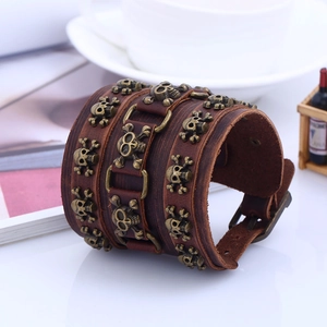 Retro wide brown leather men's bracelet with brass skull rivets and buckle closure