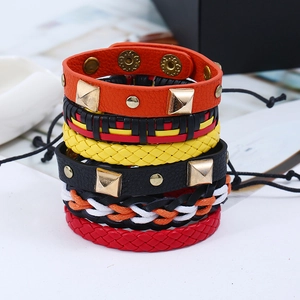 Vintage braided leather bracelet set with colorful straps and punk style metal studs