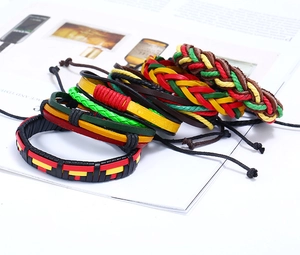 Detailed view of six-piece multilayer braided leather bracelets in vibrant reggae colors