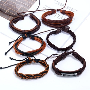 Set of 6 vintage multilayer braided leather bracelets with metallic forgiven plaque