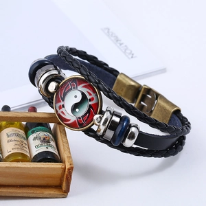 Multilayer braided leather bracelet with Tai Chi Yin Yang symbol and vintage beads