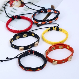 Vintage braided leather bracelet set with metallic studs and colorful cords for men
