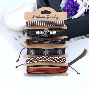 Set of six vintage braided leather bracelets for men with leaf charms and metal accents