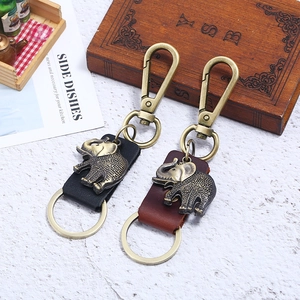 Retro elephant alloy keychain with genuine leather straps in black and brown finishes