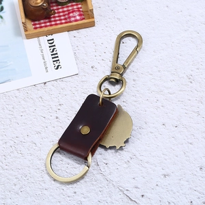 Retro dragon alloy pendant keychain with brown leather strap and antique bronze metal finish