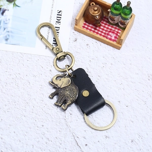 Vintage elephant alloy keychain with black leather strap and bronze lobster clasp