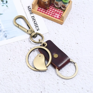 Vintage bronze alloy bird pendant keychain with genuine brown leather strap for men