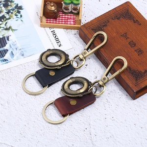 Vintage leather keychain set with antique bronze charms in black and dark brown finish