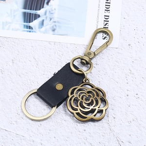 Vintage bronze camellia flower charm keychain with black leather strap for men