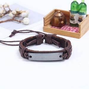 Vintage multilayer woven leather bracelet for men featuring an antique silver metal plaque