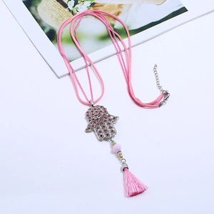 Pink Hamsa Hand pendant necklace with sparkling rhinestones and silk tassel decor