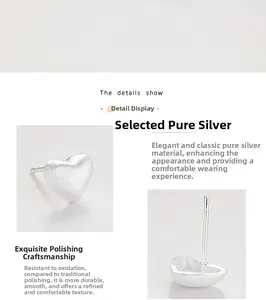 Detail showing brushed heart-shaped S925 sterling silver stud earrings with polished edges