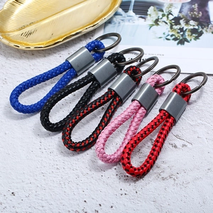 Braided leather keychains in multiple colors with gunmetal keyrings and metal clips