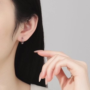 Minimalist S925 sterling silver geometric hoop earrings on female model