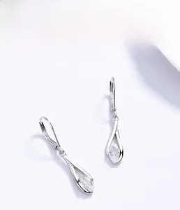 Macro shot of S925 sterling silver teardrop earrings with marquise-cut cubic zirconia