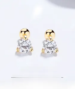 Macro detail of S925 sterling silver three-prong zircon stud earrings with screw backs